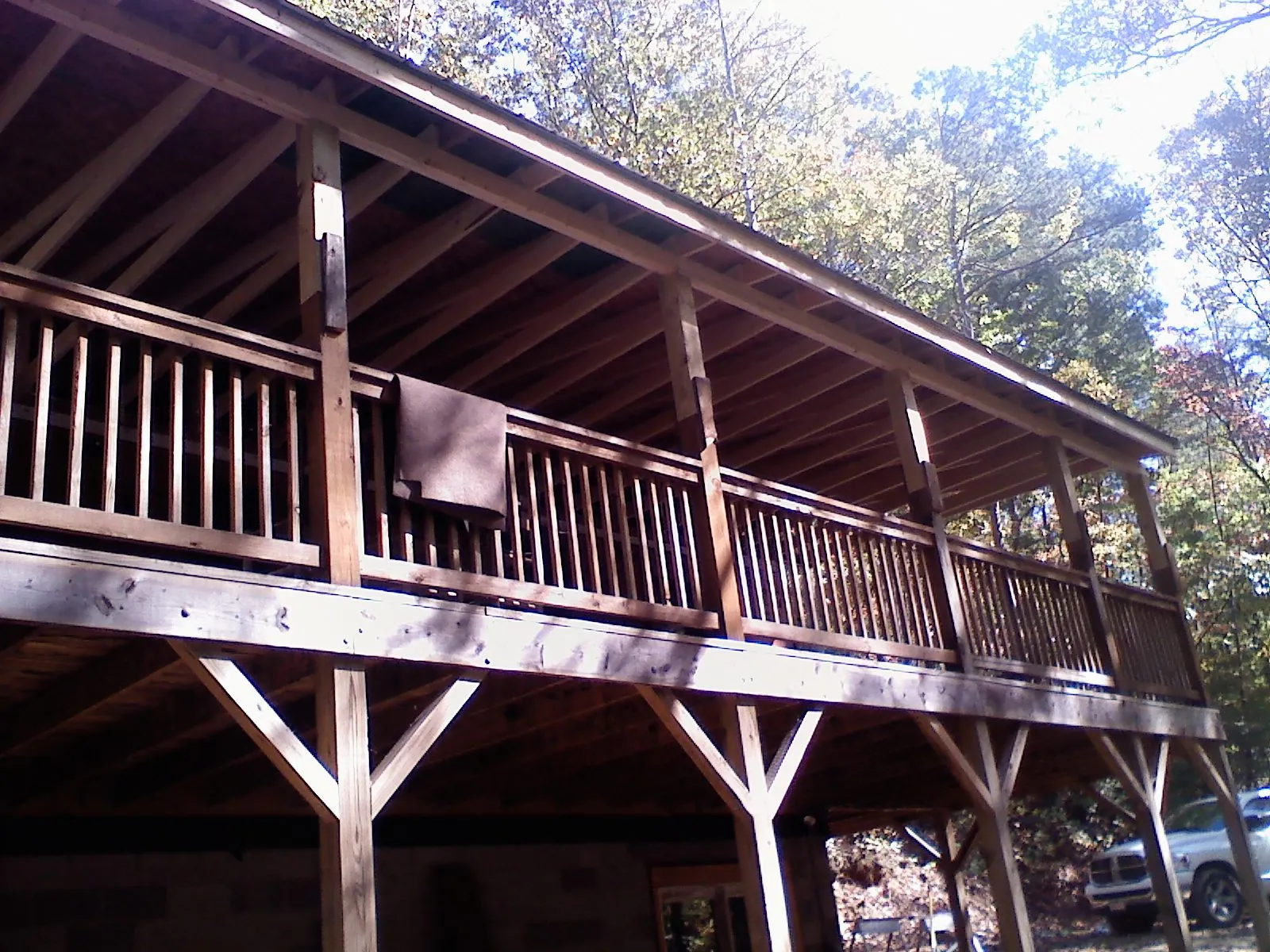 Timber framing under a new elevated porch and deck — Roof Leak Repair in Checotah by Roofing Brothers